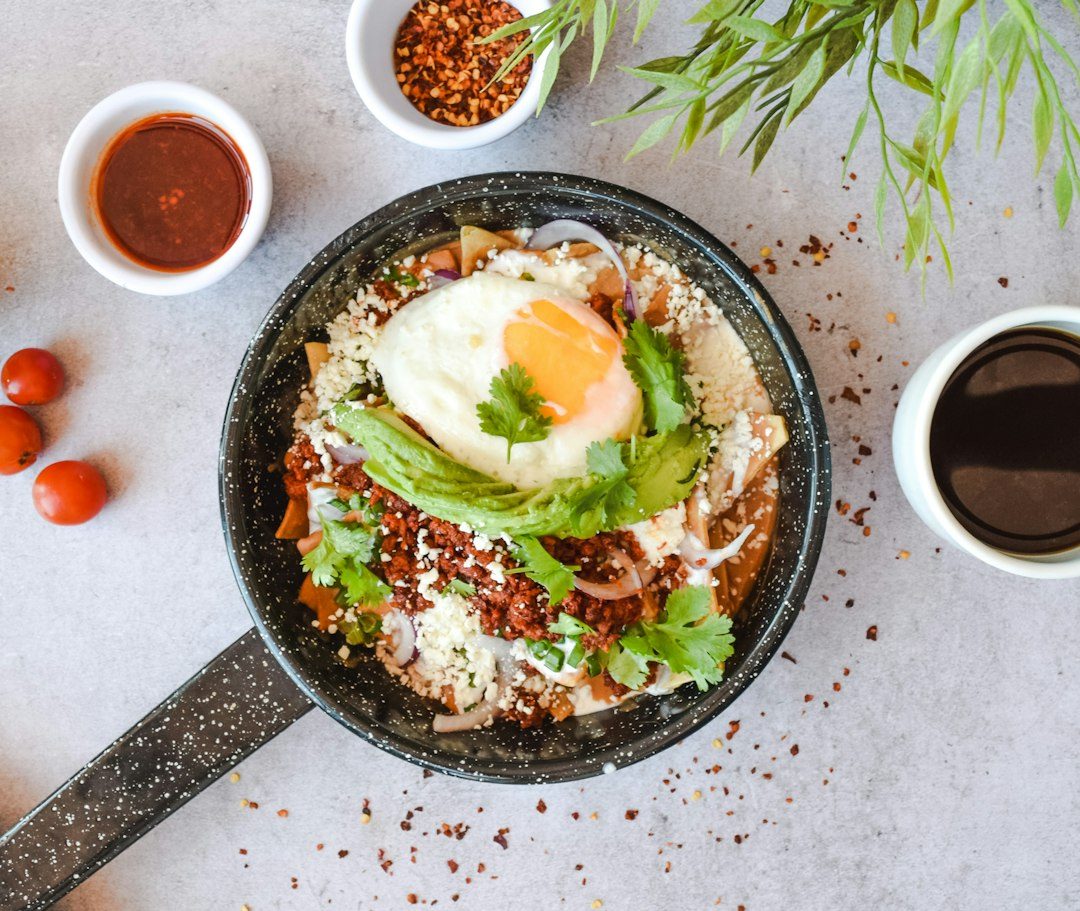 Skillet Chilaquiles Rojos with Fried Eggs